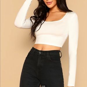 Cropped white long sleeve top
